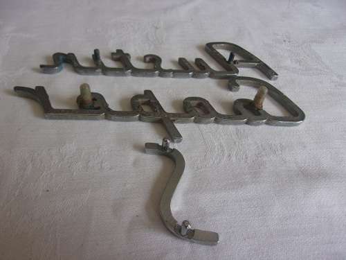 Vintage Austin Cooper S front & back metal badge set