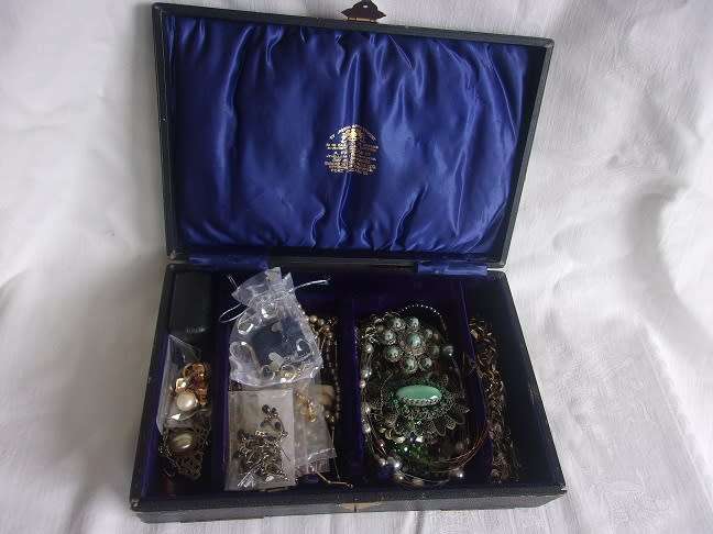 Large lot of vintage costume jewellery in an old box