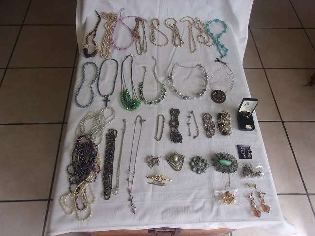 Large lot of vintage costume jewellery in an old box