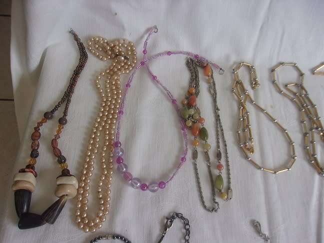 Large lot of vintage costume jewellery in an old box