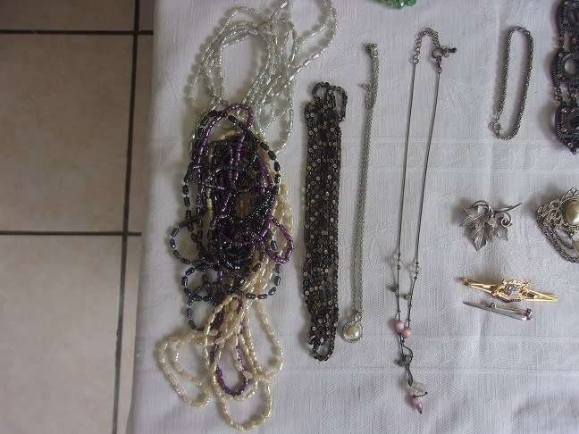 Large lot of vintage costume jewellery in an old box