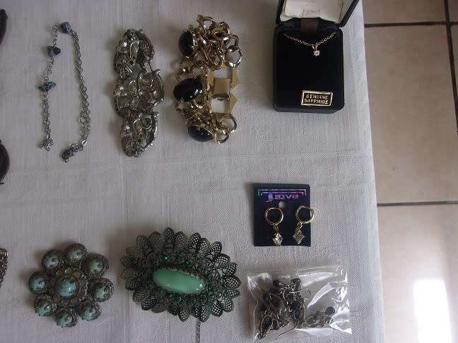 Large lot of vintage costume jewellery in an old box