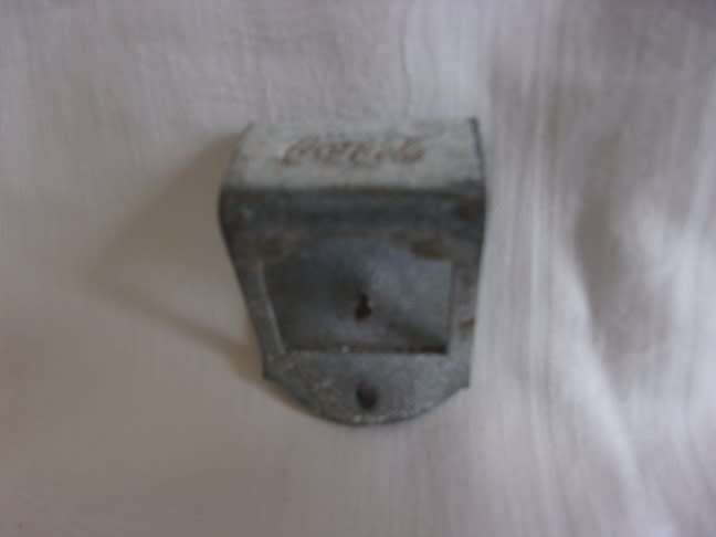 2 Vintage Coca-Cola cooler bottle openers for 1 bid