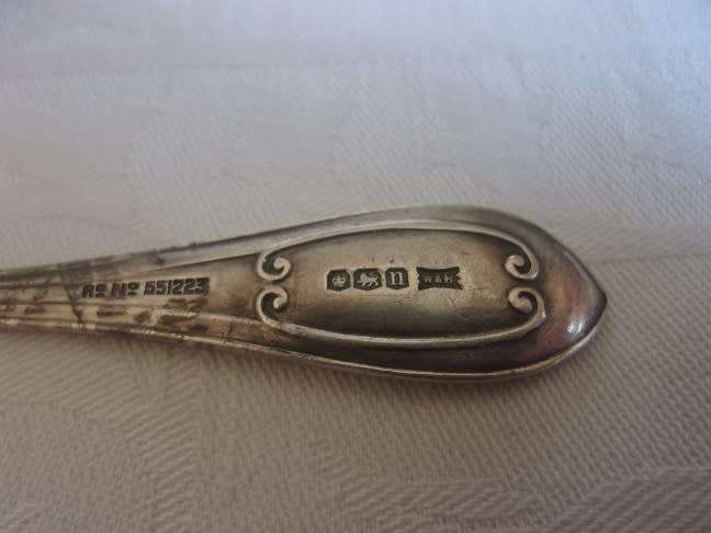 4 Sterling silver napkin rings & a jam spoon for 1 bid - 122.5g