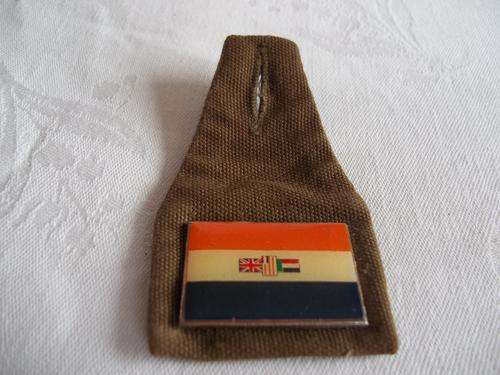 Old small SADF badge/flash - on browns cloth with old metal SA flag