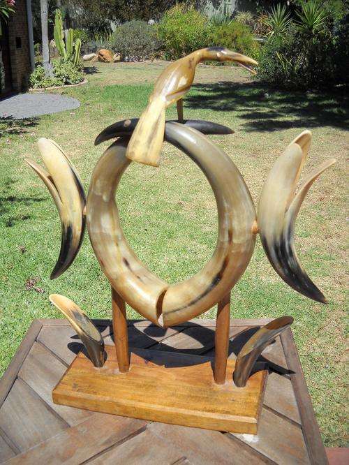 RETRO AFRICA!!!! LARGE VINTAGE HORN ORNAMENT ON WOODEN STAND IN VERY GOOD  CONDITION