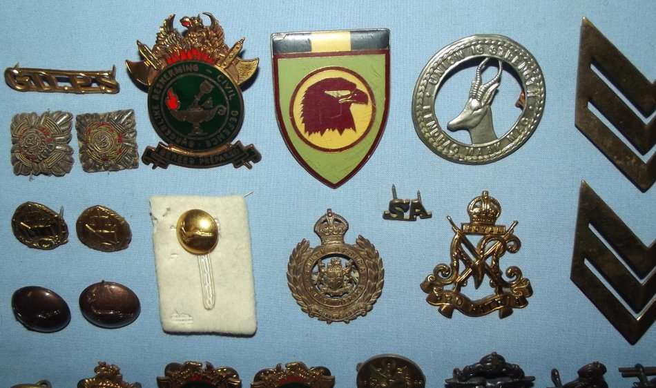Collection of 50 Military Badges and Buttons