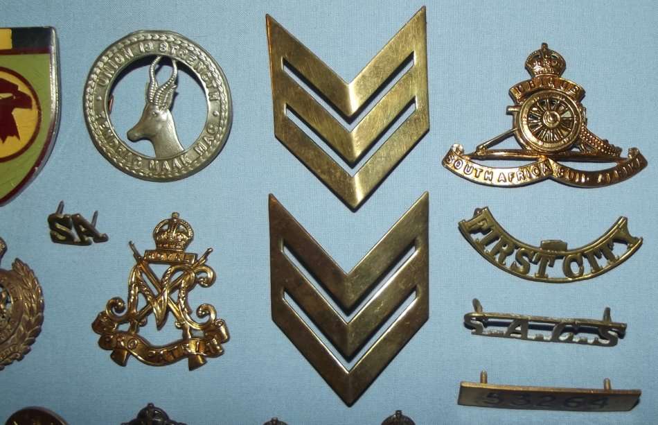 Collection of 50 Military Badges and Buttons