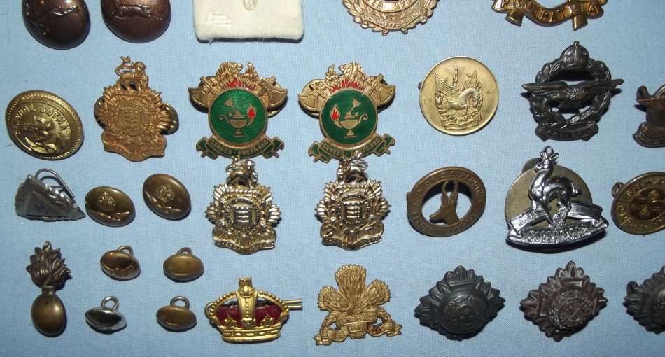 Collection of 50 Military Badges and Buttons