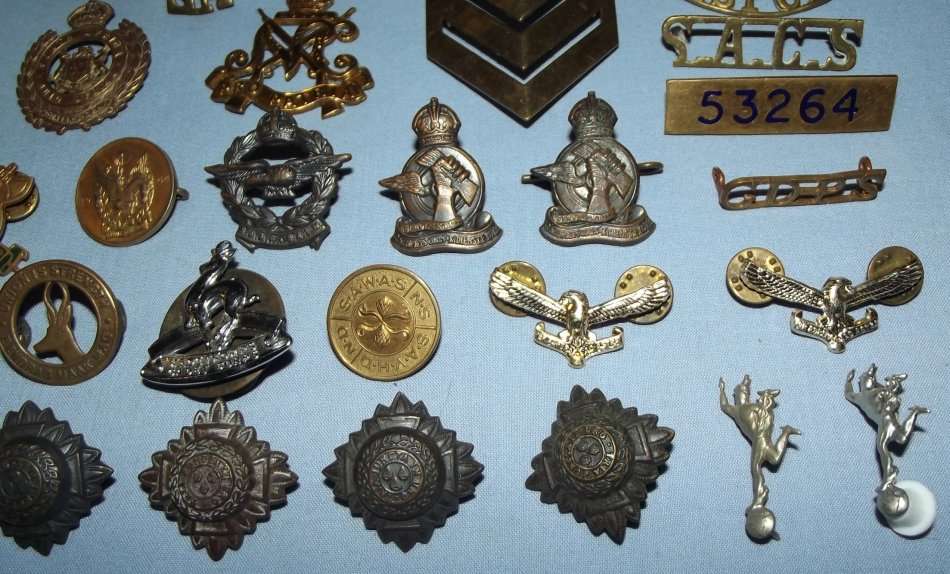 Collection of 50 Military Badges and Buttons