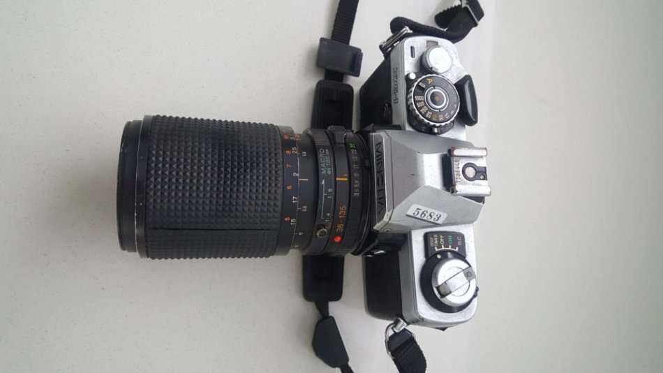 VINTAGE MINOLTA XG -1 35MM CAMERA WITH ZOOM LENS