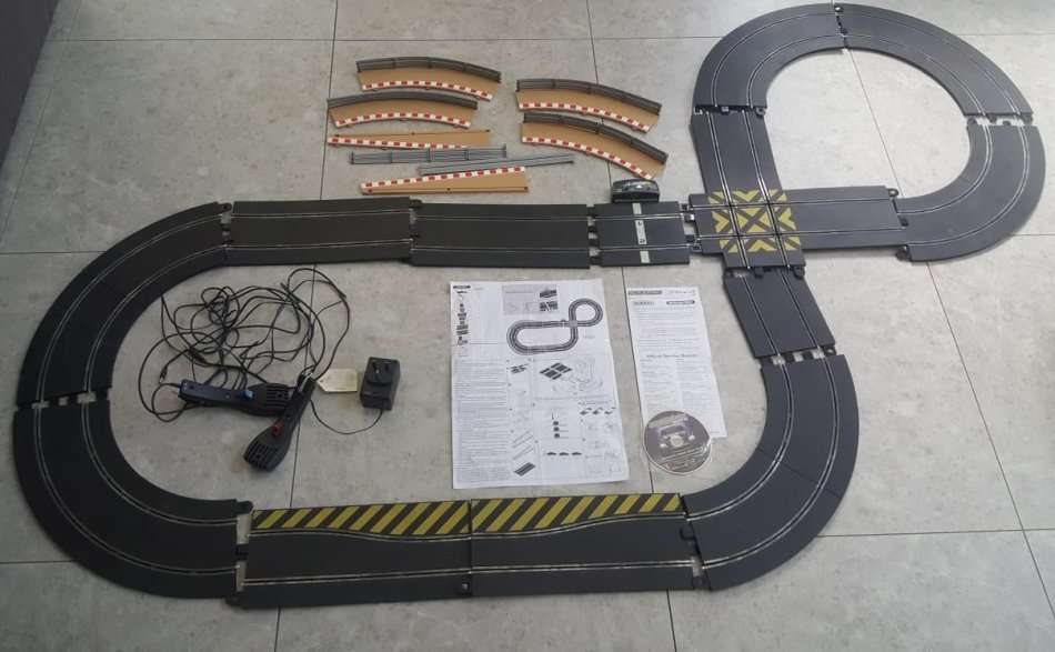 2007 HORNBY SCALEXTRIC SET - TRACKS, RAILINGS, 2 CONTROLLERS, ADAPTER ETC