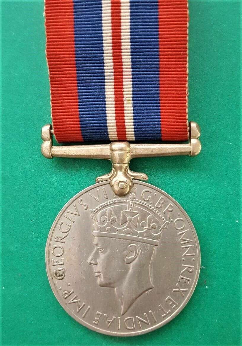 WW2 Full Size 1939-1945 War Medal - Named to C289210 W. OLIFANT