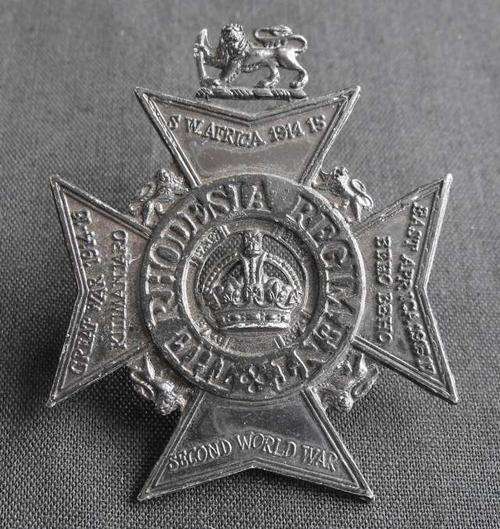 THE RHODESIA REGIMENT METAL CAP BADGE