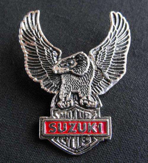 OLD SUZUKI MOTORCYCLES METAL BADGE