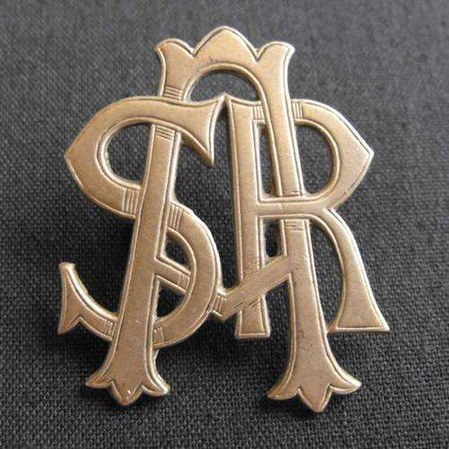 OLD SA RAILWAYS WHITE METAL CAP BADGE
