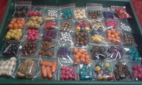 40 pkts of assorted woodbeads you bidding on