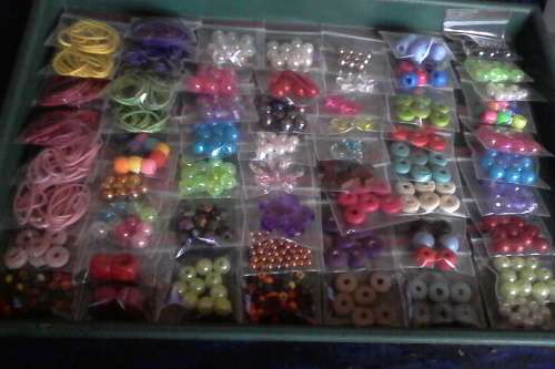 assorted pkts of acrylic  ,wood and wax cord..60pkts for all on photo