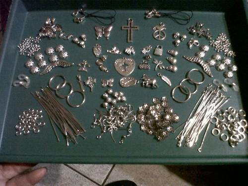 Metal mix with pendants,charms, etc(Bid on 35pkts for whole mix)