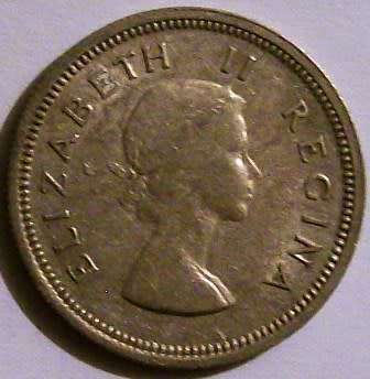 1960  shilling  Please see photos below. 50% Silver -Circulated coin.