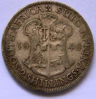 1949  Two shillings Please see photos below. 80% Silver -Circulated coin.