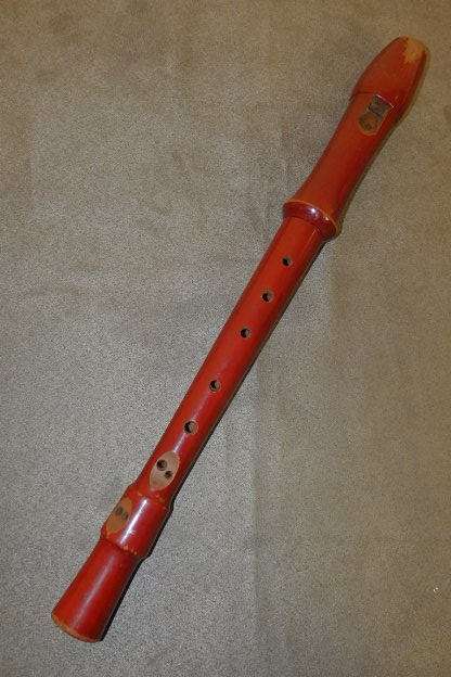 AN AWESOME VINTAGE GERMAN MADE "DULCET SCHOLAR" WOODEN RECORDER WITH A MILITARY RED LACQUERED COLOUR