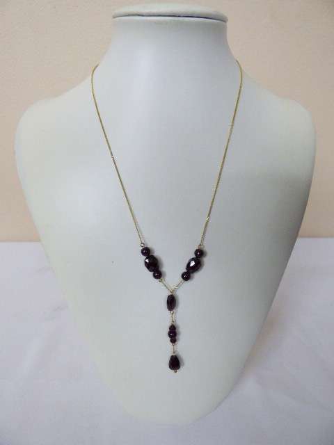 A BEAUTIFUL AND DAINTY GOLD CHAIN WITH GORGEOUS MAROON GARNETS. STUNNING!!