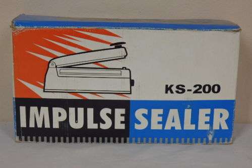 AN AWESOME ELECTRONIC PLASTIC PACKET IMPULSE SEALING UNIT IN ITS ORIGINAL BOX WITH INSTRUCTIONS