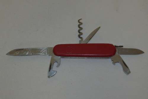 AN AWESOME VINTAGE SWISS MADE VICTORINOX STAINLESS STEEL "ECONOMY" SWISS ARMY KNIFE
