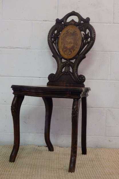 A RARE ANTIQUE GERMAN BLACK FOREST MUSICAL SIDE CHAIR WITH MARQUETRY INLAID SEAT AND BACKREST