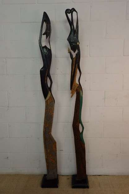 TWO SPECTACULAR TALL HAND CARVED AFRICAN WOODEN FIGURINES WITH STUNNING FINISHINGS bid/figurine