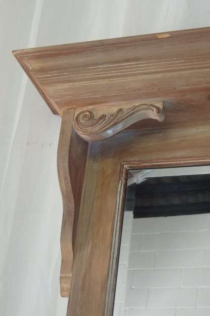 A BEAUTIFUL WALL MANTEL MIRROR WITH A BEVELLED GLASS MIRROR AND EXQUISITE CORNICE TOP