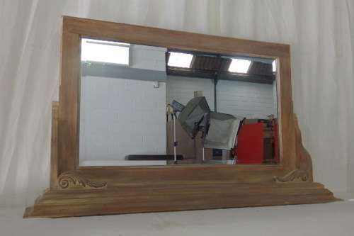A BEAUTIFUL WALL MANTEL MIRROR WITH A BEVELLED GLASS MIRROR AND EXQUISITE CORNICE TOP