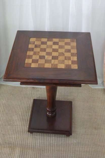 A BEAUTIFULLY MADE VINTAGE SOLID TEAK PEDESTAL CHESS BOARD WITH TEAK AND YELLOW WOOD INLAY SQUARES