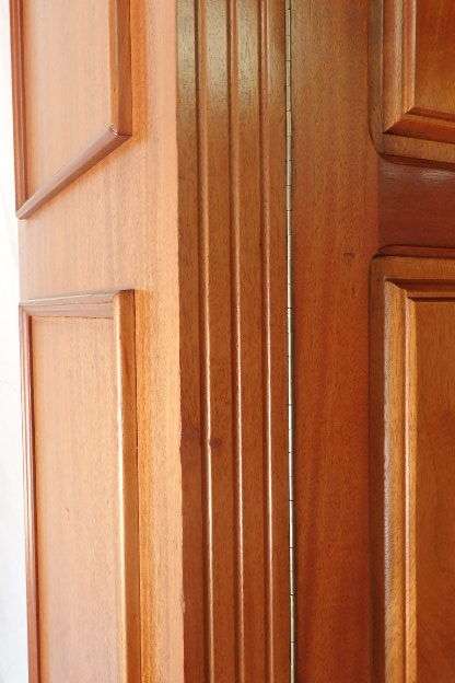 A SPECTACULAR TALL (2.2m) GRECIAN GABLED SOLID MAHOGANY WARDROBE WITH SOLID BRASS HANDLES