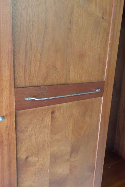 A SPECTACULAR TALL (2.2m) GRECIAN GABLED SOLID MAHOGANY WARDROBE WITH SOLID BRASS HANDLES