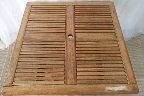 AN EXQUISITE "FETCHERS OF KNYSNA" "LADYSMITH" SALIGNA WOOD FOUR SEATER PATIO DINING TABLE