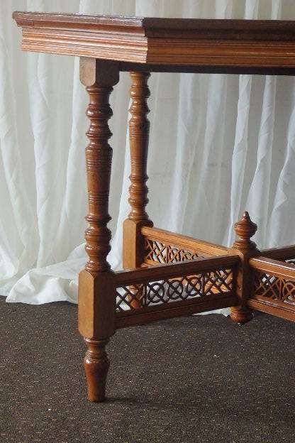 A BEAUTIFUL ANTIQUE ORIENTAL ELM WOOD OCCASIONAL TABLE w/ TURNED LEGS AND BEAUTIFUL CUT-OUT SUPPORTS