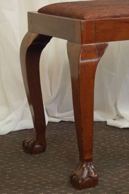 A BEAUTIFUL AND VERY WELL MADE ANTIQUE SOLID IMBUIA BALL AND CLAW DRESSING TABLE STOOL