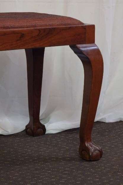 A BEAUTIFUL AND VERY WELL MADE ANTIQUE SOLID IMBUIA BALL AND CLAW DRESSING TABLE STOOL
