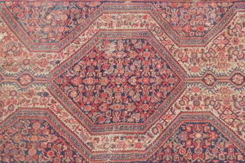 A MAGNIFICENT ANTIQUE PERSIAN CARPET (2.1m x 1.3m) WITH LOADS OF CHARACTER AND CHARM