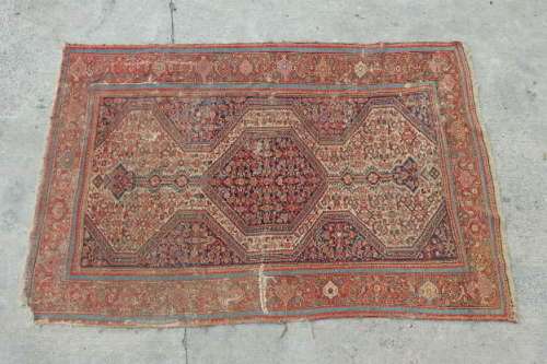 A MAGNIFICENT ANTIQUE PERSIAN CARPET (2.1m x 1.3m) WITH LOADS OF CHARACTER AND CHARM