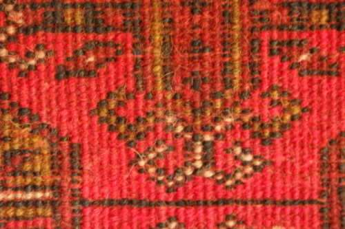 A BEAUTIFUL DEEP RED PERSIAN CARPET/ MAT (1m x 58cm)  - THE IDEAL BEDSIDE CARPET