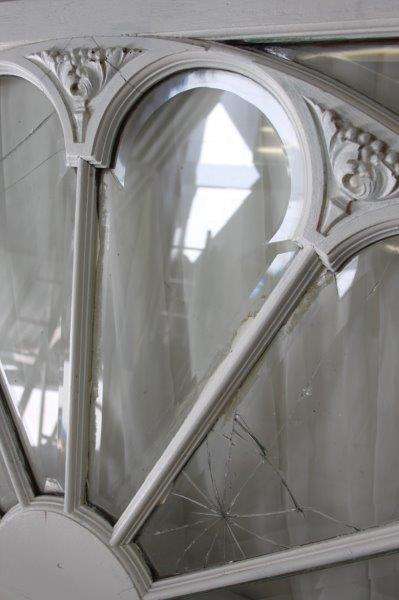 A RARE AND MAGNIFICENT ANTIQUE BEVELED GLASS "PEACOCK" DOUBLE DOOR ARCH TRANSOM WINDOW