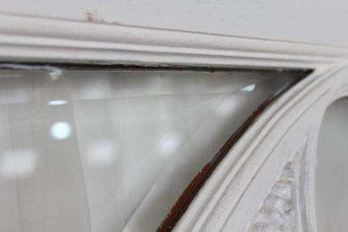 A RARE AND MAGNIFICENT ANTIQUE BEVELED GLASS "PEACOCK" DOUBLE DOOR ARCH TRANSOM WINDOW