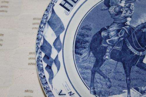 AN EXTREMELY RARE SOCIETE CERAMIQUE MAASTRICHT "HERRIJZEND NEDERLAND" LIBERATION COMMEMORATIVE PLATE