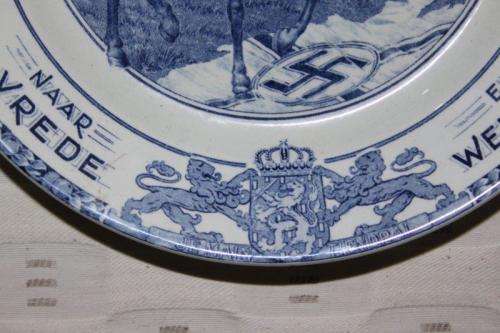 AN EXTREMELY RARE SOCIETE CERAMIQUE MAASTRICHT "HERRIJZEND NEDERLAND" LIBERATION COMMEMORATIVE PLATE