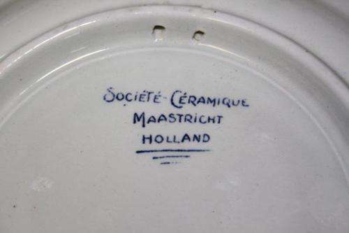 AN EXTREMELY RARE SOCIETE CERAMIQUE MAASTRICHT "HERRIJZEND NEDERLAND" LIBERATION COMMEMORATIVE PLATE