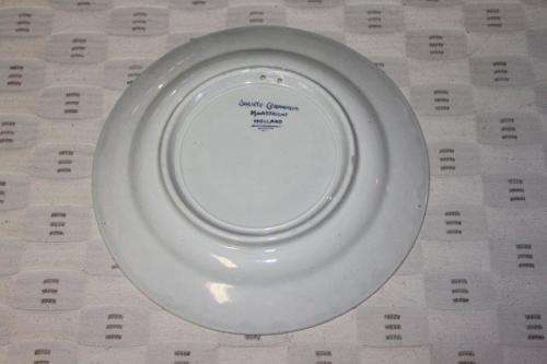 AN EXTREMELY RARE SOCIETE CERAMIQUE MAASTRICHT "HERRIJZEND NEDERLAND" LIBERATION COMMEMORATIVE PLATE