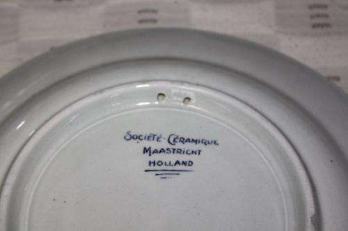 AN EXTREMELY RARE SOCIETE CERAMIQUE MAASTRICHT "HERRIJZEND NEDERLAND" LIBERATION COMMEMORATIVE PLATE